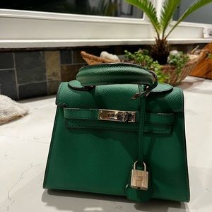 Hermès Kelly 25 Leather Handbag